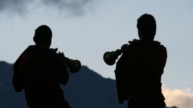 Monks playing trumpets on the Annapurna circuit